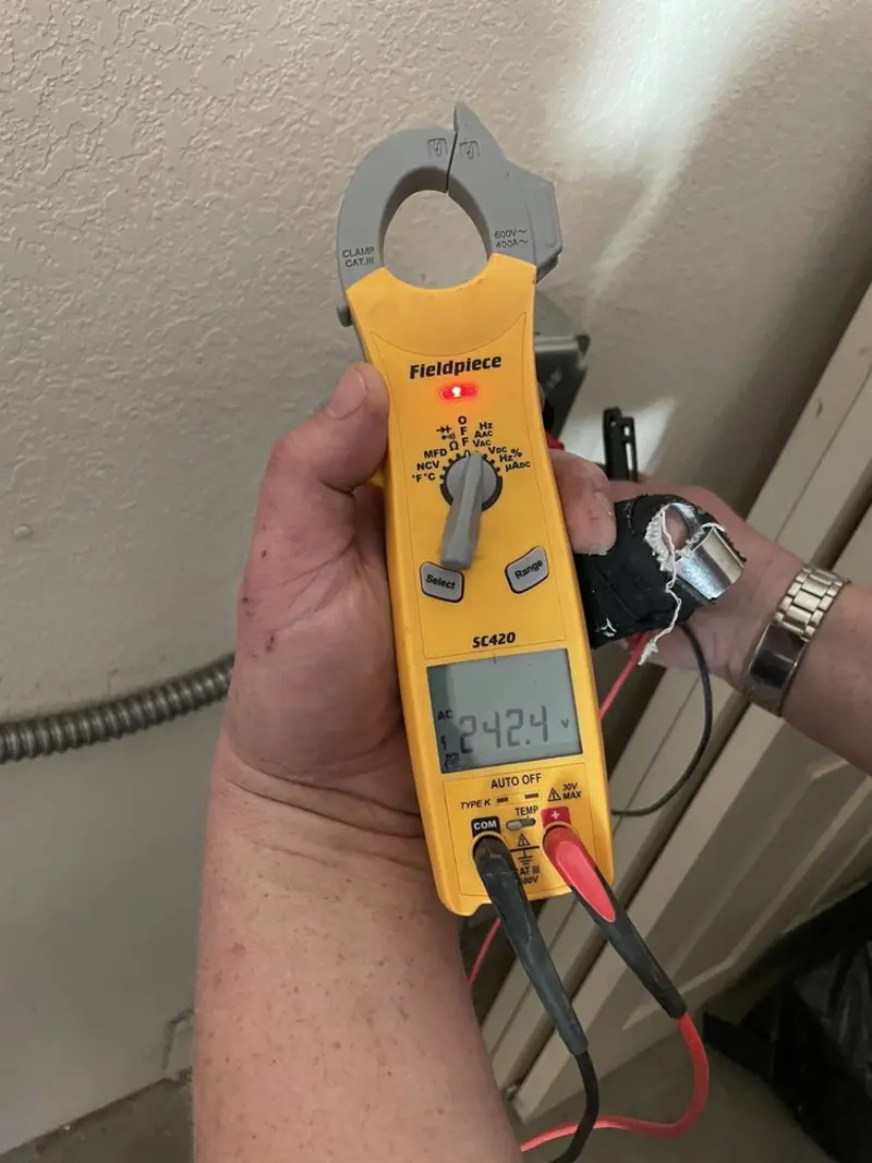 Voltage testing with clamp meter during Recessed Lighting Installation in Novi